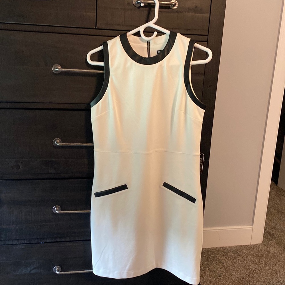 Express dress, never worn. Tags still on the dress. Cute dress for the office.